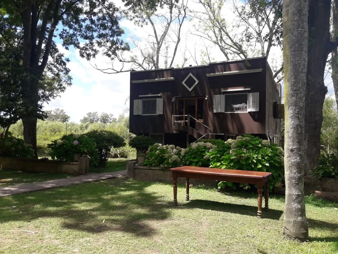 Casa 5 ambientes sobre arroyo caraguata, foto 2