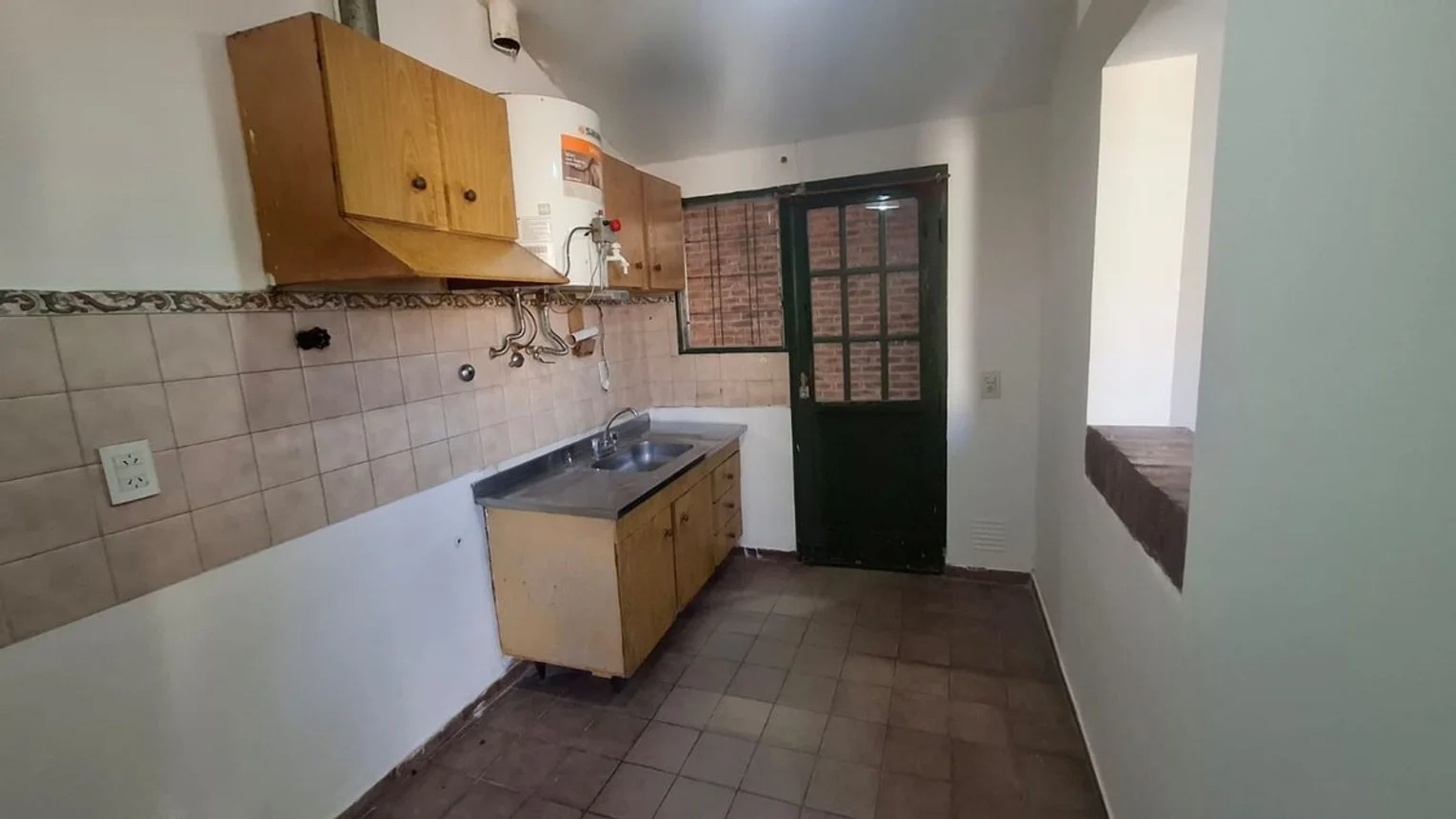 Casa en venta de 3 dormitorios y dos baños, foto 3