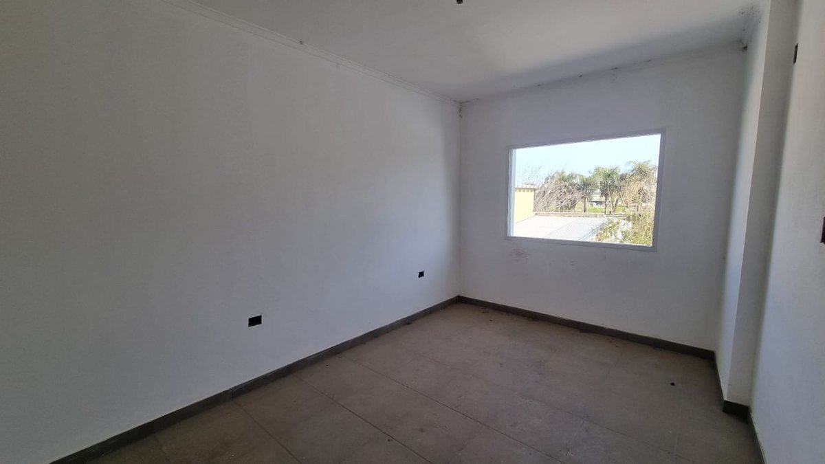 Foto 5 — DEPARTAMENTO DE 2 DORMITORIOS CON COCHERA Y PATIO