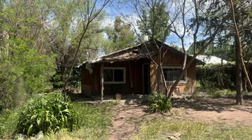 VENTA DE LOTE CON CABAÑA-RUTA 82 LAS COMPUERTAS