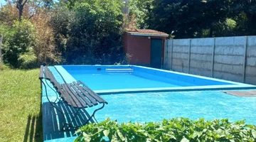 VENTA CASA CON PILETA TORTUGUITAS 950 MTR- PERMUTA