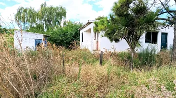 Venta de terreno con construcción  en Pando