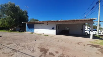 VENTA DE LOTE SOBRE LA RUTA 11 CON CONSTRUCCION