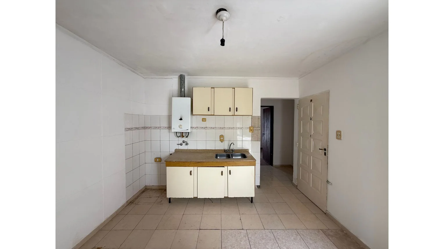 Departamento en planta alta con doble balcón, foto 1